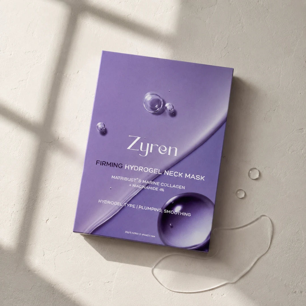 Zyren Firming Hydrogel Neck Mask box lying on a sunlit surface next to drops of clear gel
